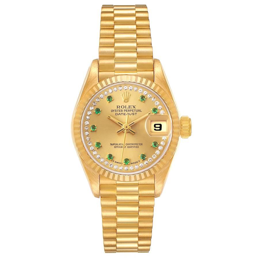 Rolex President Datejust Yellow Gold String Diamond Emerald  Ladies Watch 69178. Officially certified chronometer self-winding movement. 18k yellow gold oyster case 26.0 mm in diameter. Rolex logo on a crown. 18k yellow gold fluted bezel. Scratch