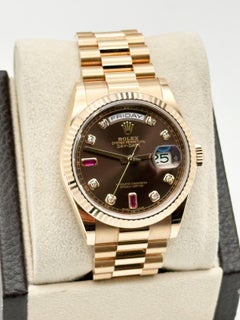 Rolex Montre President Day Date 118235 chocolat diamant rubis cadran en or rose 18 carats 36 mm