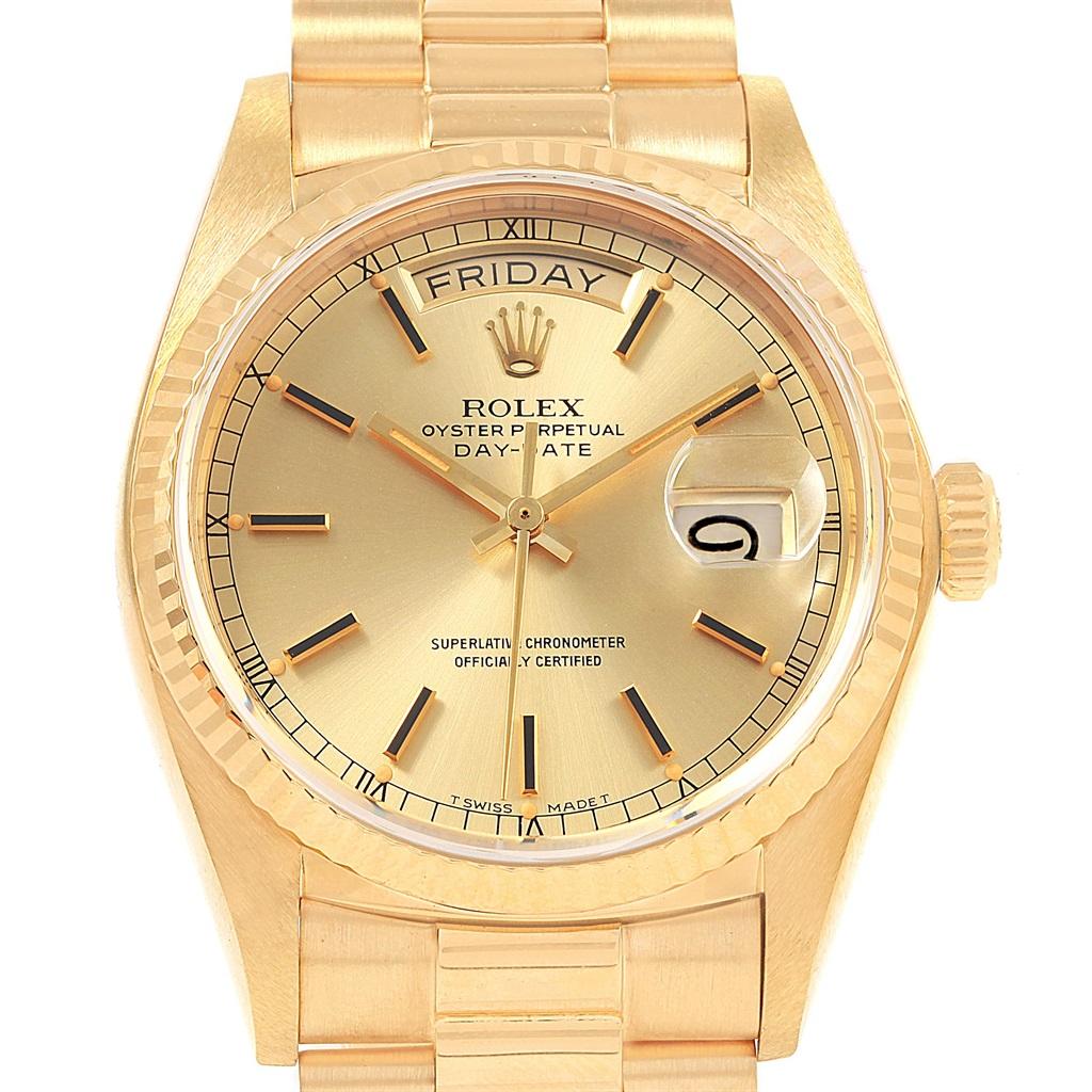 Rolex President Day-Date Mens 18k Yellow Gold Mens Watch 18038. Officially certified chronometer self-winding movement. 18k yellow gold oyster case 36.0 mm in diameter. Rolex logo on a crown. 18k yellow gold fluted bezel. Scratch resistant sapphire