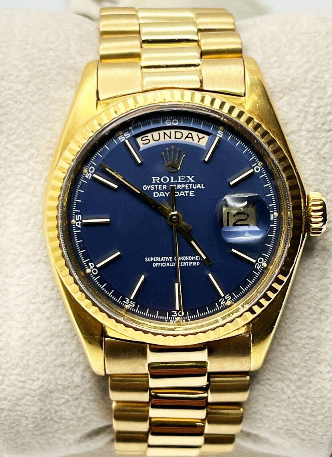 Style Number: 1803

Serial: 1669***

Year: 1967
 
Model: President Day Date
 
Case Material: 18K Yellow Gold
 
Band: 18K Yellow Gold
 
Bezel: 18K Yellow Gold
 
Dial: Rare Factory Blue Pie Pan Dial
 
Face: Acrylic 
 
Case Size: 36mm
 
Includes: