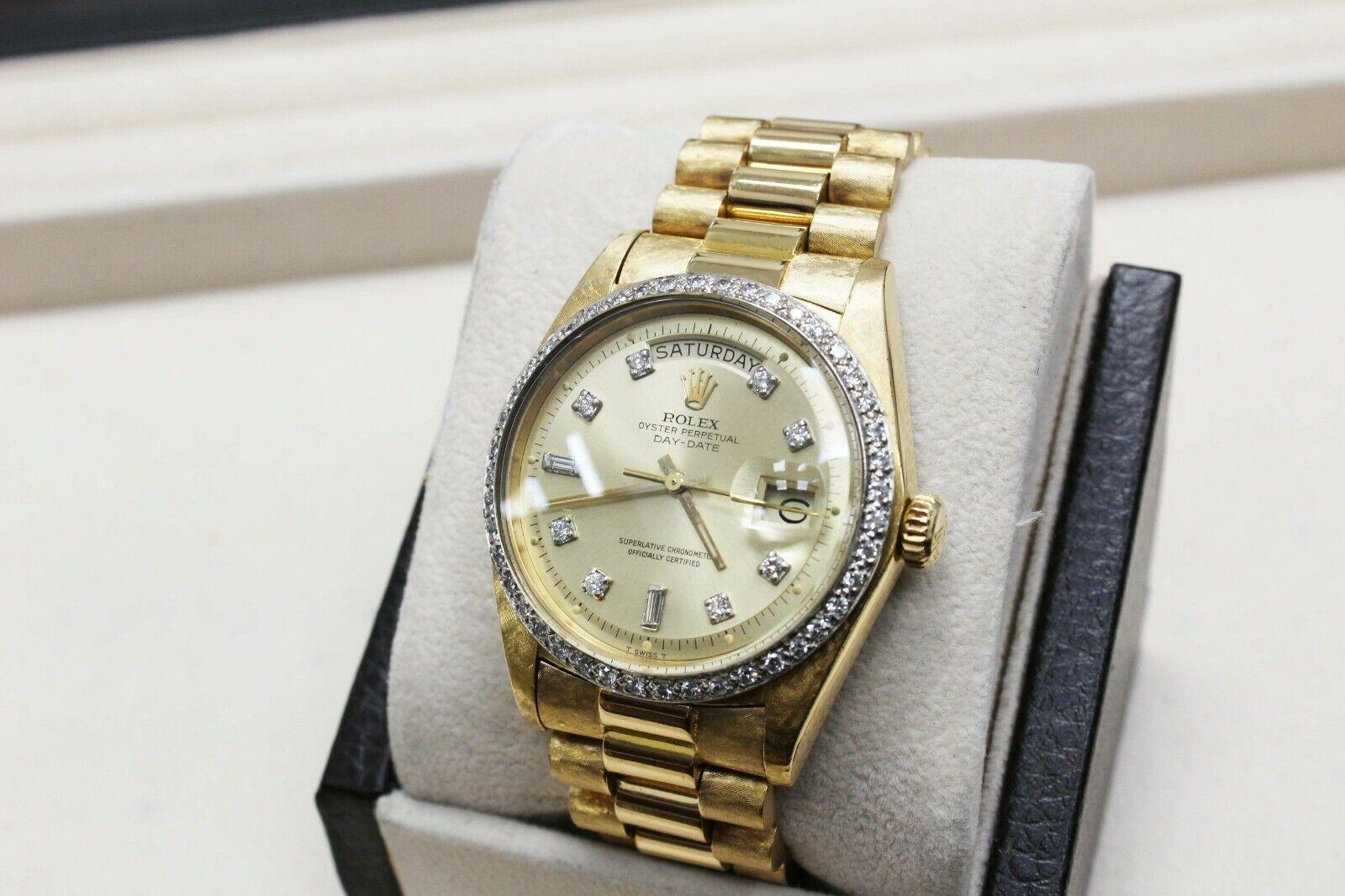 Style Number: 1803
 
Serial: 3381***
 
Model: President Day Date
 
Case Material: 18K Yellow Gold
 
Band: 18K Yellow Gold
 
Bezel: Custom Diamond Bezel 
 
Dial: Custom Diamond Dial
 
Face: Acrylic 
 
Case Size: 36mm
 
Includes: 
-Elegant Watch