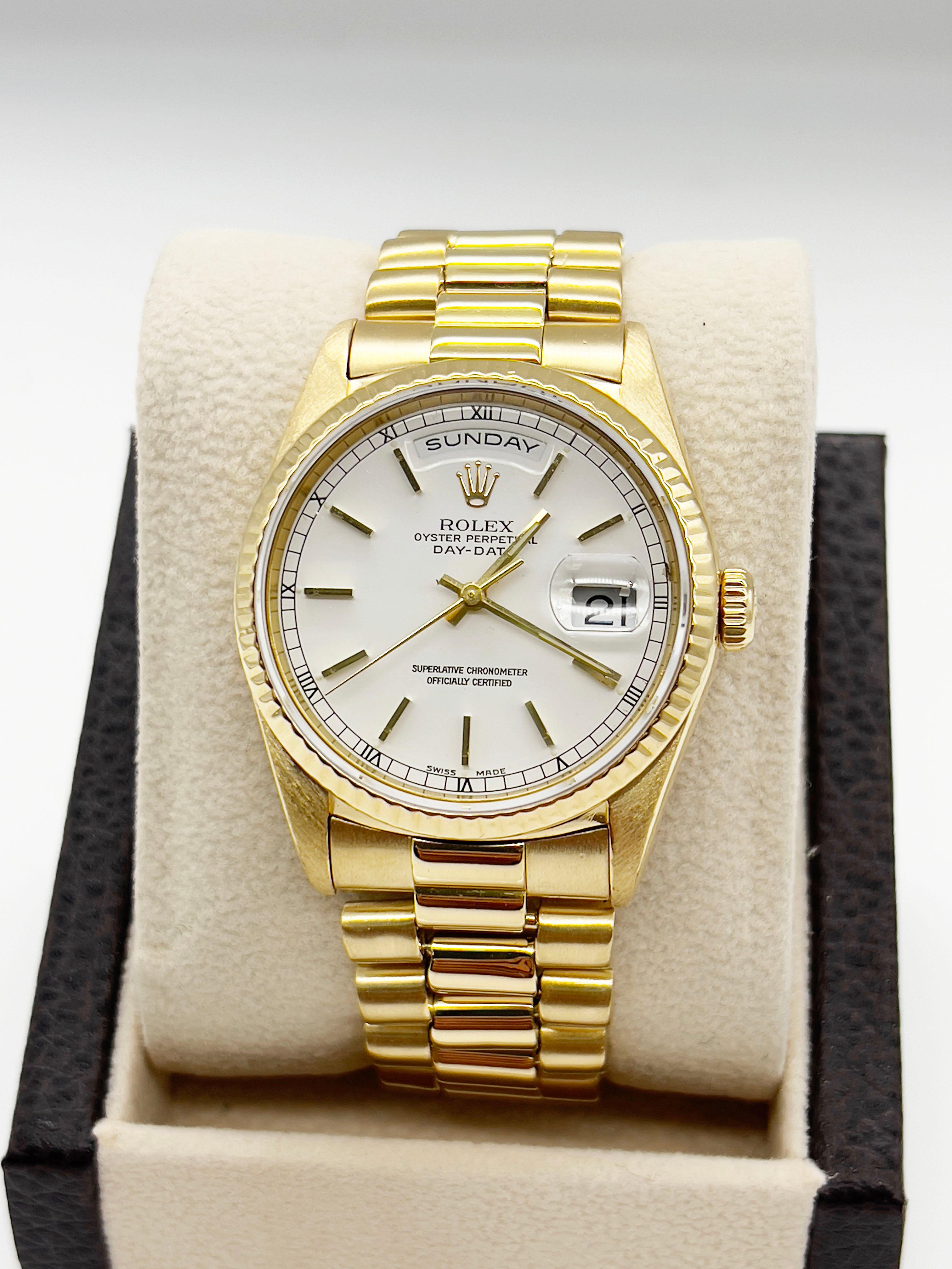 Style Number: 18238
Serial: L272***
Year: 1989
Model: Rolex President Day Date Double Quickset
Case Material: 18K Yellow Gold 
Band: 18K Yellow Gold 
Bezel: 18K Yellow Gold 
Dial: White Dial 
Face: Sapphire Crystal 
Case Size: 36mm 
Includes: