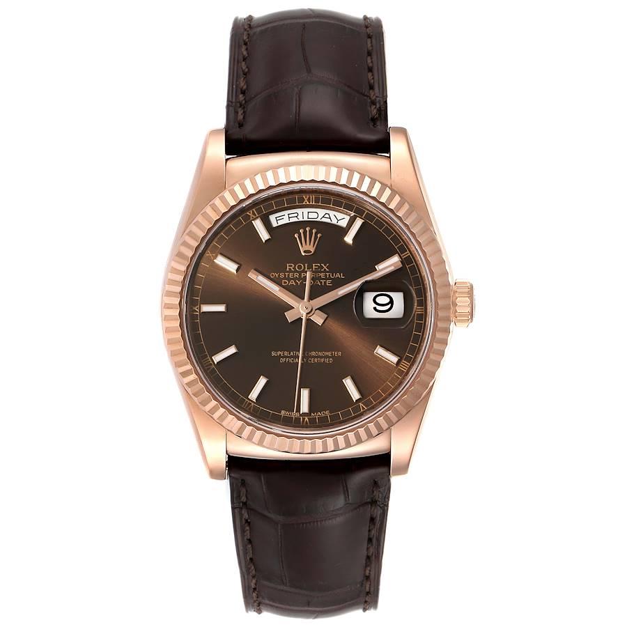 Rolex President Day-Date 18k Everose Gold Chocolate Mens Watch 118135 Unworn. Officially certified chronometer self-winding movement. 18k rose gold oyster case 36.0 mm in diameter.  Rolex logo on the crown. 18k rose gold fluted bezel. Scratch