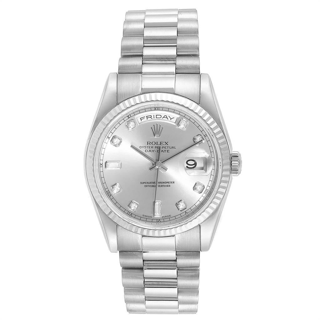 Rolex President Day-Date 18k White Gold Diamond Mens Watch 118239. Officially certified chronometer automatic self-winding movement. 18k white gold oyster case 36.0 mm in diameter. Rolex logo on a crown. 18k yellow gold fluted bezel. Scratch