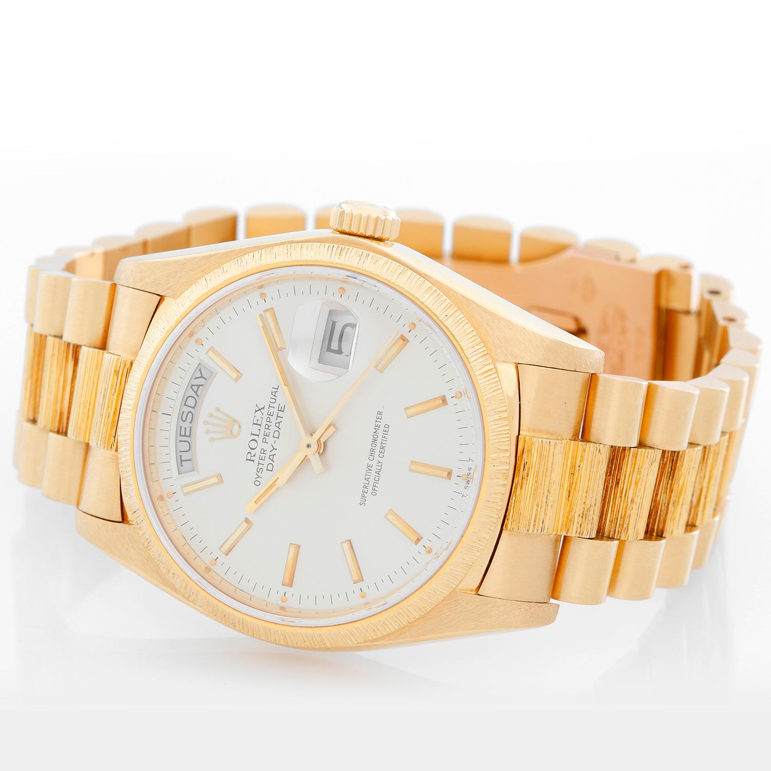 Rolex President Day-Date 18k Yellow Gold Bark Finish Men's Watch 18078 - Automatic winding with day and date. 18k yellow gold case with bark finished bezel (36mm diameter). Silver dial with stick hour markers. 18k yellow gold President bracelet with
