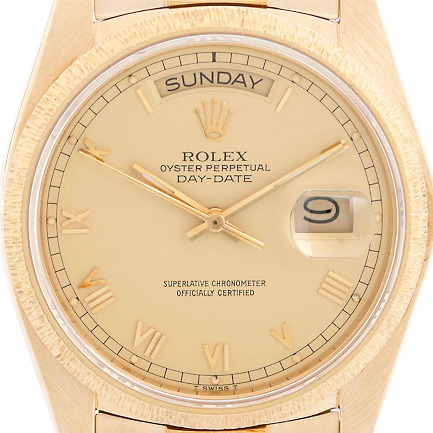 Rolex President Day-Date 18k Yellow Gold Bark Finish Men's Watch 18078 - Automatic winding with day and date. 18k yellow gold case with bark finished bezel (36mm diameter). Champagne dial with skinny roman numerals. 18k yellow gold President