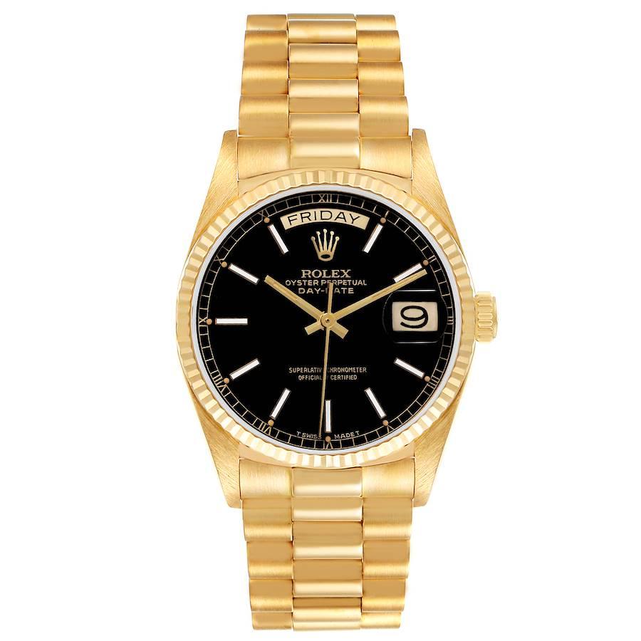 Rolex President Day Date 18k Yellow Gold Black Dial Mens Watch 18038. Officially certified chronometer self-winding movement. 18k yellow gold oyster case 36 mm in diameter. Rolex logo on the crown. 18K yellow gold fluted bezel. Scratch resistant