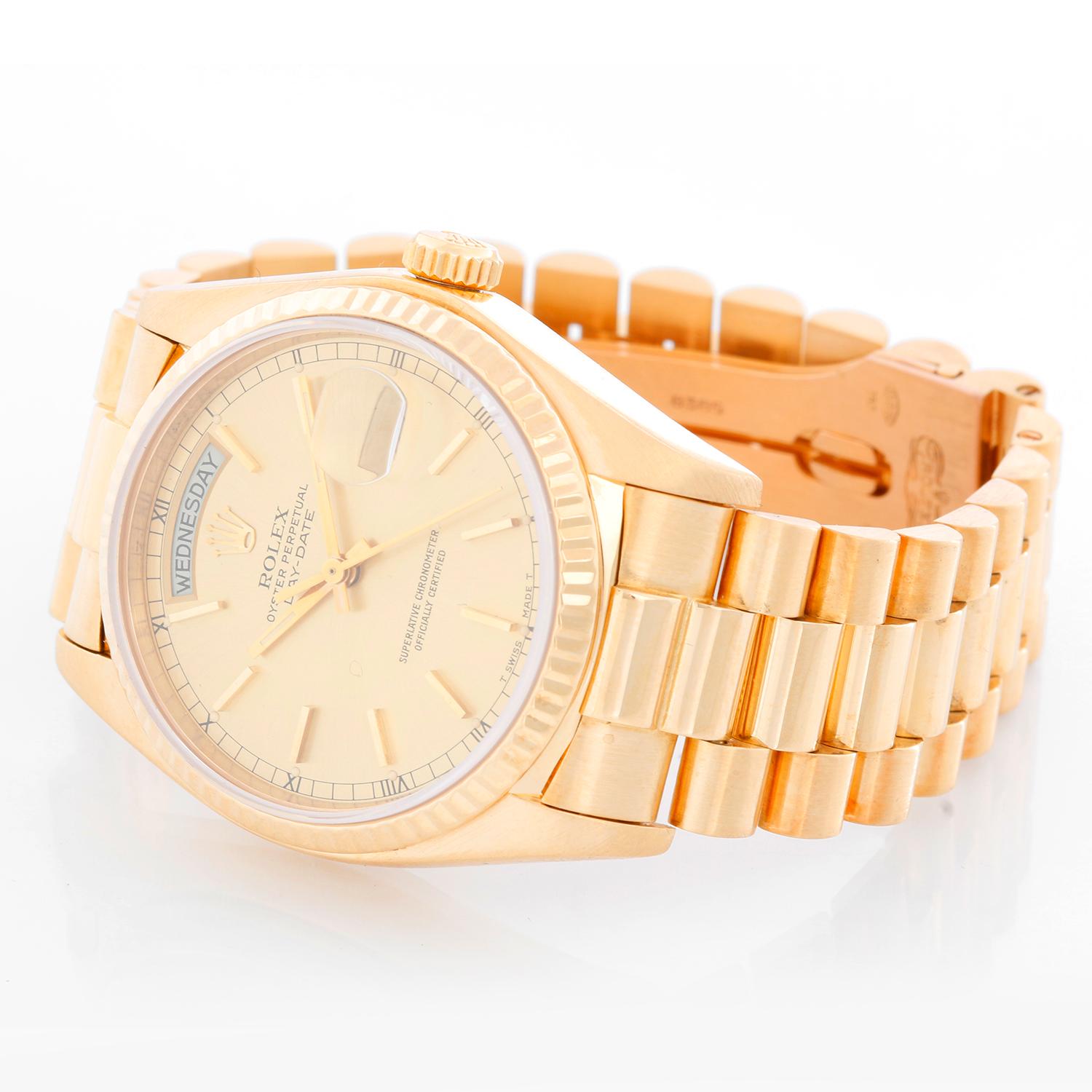 Rolex President Day-Date 18k Yellow Gold Men's Watch 18038 - Automatic winding; quick-set; sapphire crystal. 18k yellow gold case with fluted bezel  (36mm diameter). Champagne dial with stick hour markers . 18k yellow gold President bracelet.