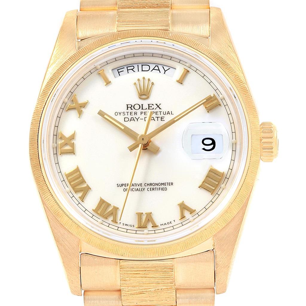 Rolex President Day-Date 36 Yellow Gold Bark Finish Mens Watch 18078. Officially certified chronometer self-winding movement with quickset date function. 18k yellow gold oyster case 36.0 mm in diameter. Rolex logo on a crown. 18k yellow gold bark