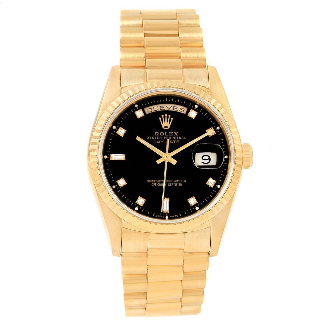 Rolex President Day-Date 36 Yellow Gold Black Diamond Dial Watch 18238. Officially certified chronometer automatic self-winding movement. 18k yellow gold oyster case 36 mm in diameter. Rolex logo on a crown. 18k yellow gold fluted bezel. Scratch