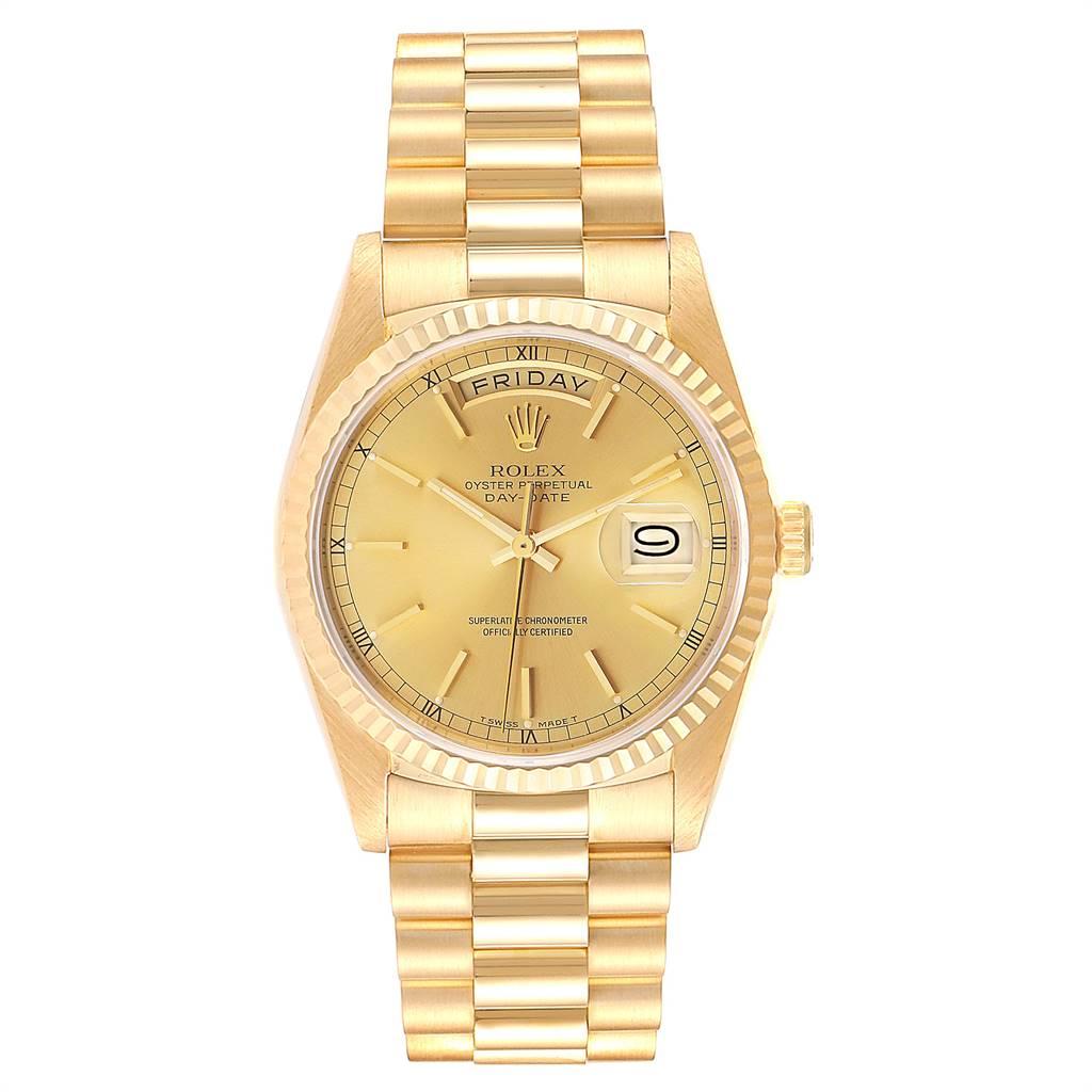 Rolex President Day-Date 36 Yellow Gold Champagne Dial Mens Watch 18238. Officially certified chronometer self-winding movement. 18k yellow gold oyster case 36.0 mm in diameter.  Rolex logo on a crown. 18K yellow gold fluted bezel. Scratch resistant