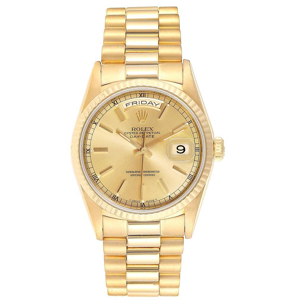 Rolex President Day-Date 36 Yellow Gold Mens Watch 18238 Box Papers. Officially certified chronometer self-winding movement. 18k yellow gold oyster case 36.0 mm in diameter.Rolex logo on a crown. 18K yellow gold fluted bezel. Scratch resistant
