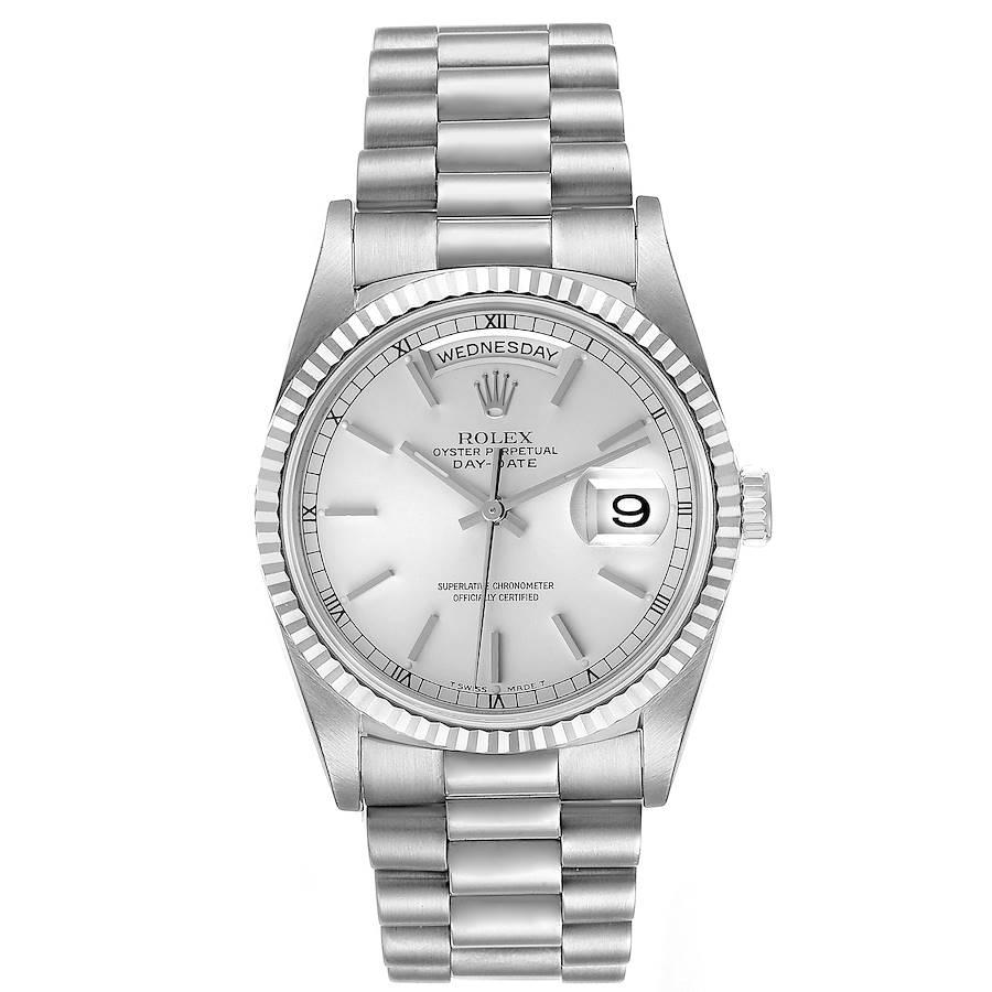Rolex President Day-Date 36mm White Gold Silver Dial Mens Watch 18239. Officially certified chronometer self-winding movement with quickset date function. 18k white gold oyster case 36.0 mm in diameter. Rolex logo on a crown. 18k white gold fluted