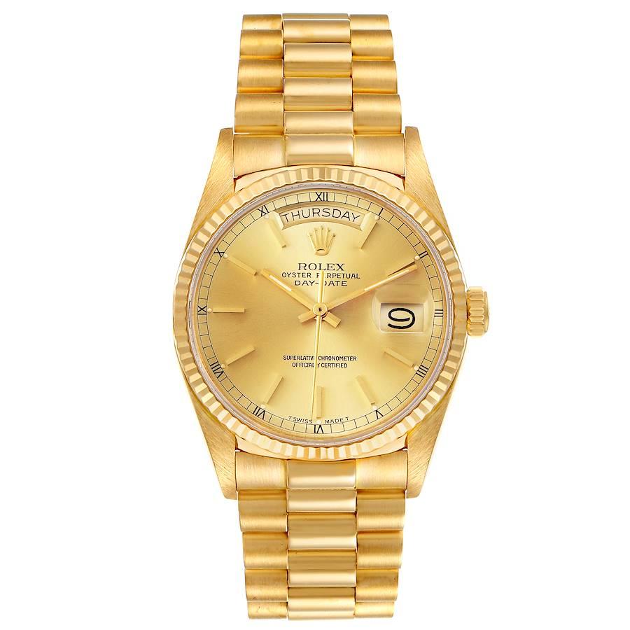 Rolex President Day-Date 36mm Yellow Gold Mens Watch 18038 Papers. Officially certified chronometer self-winding movement. 18k yellow gold oyster case 36.0 mm in diameter.  Rolex logo on a crown. 18k yellow gold fluted bezel. Scratch resistant