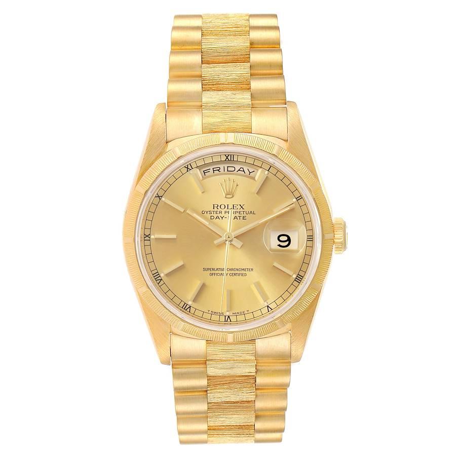 Rolex President Day-Date 36mm Yellow Gold Mens Watch 18248 Box. Officially certified chronometer self-winding movement. 18k yellow gold oyster case 36 mm in diameter.  Rolex logo on a crown. 18k yellow gold bark finish bezel. Scratch resistant