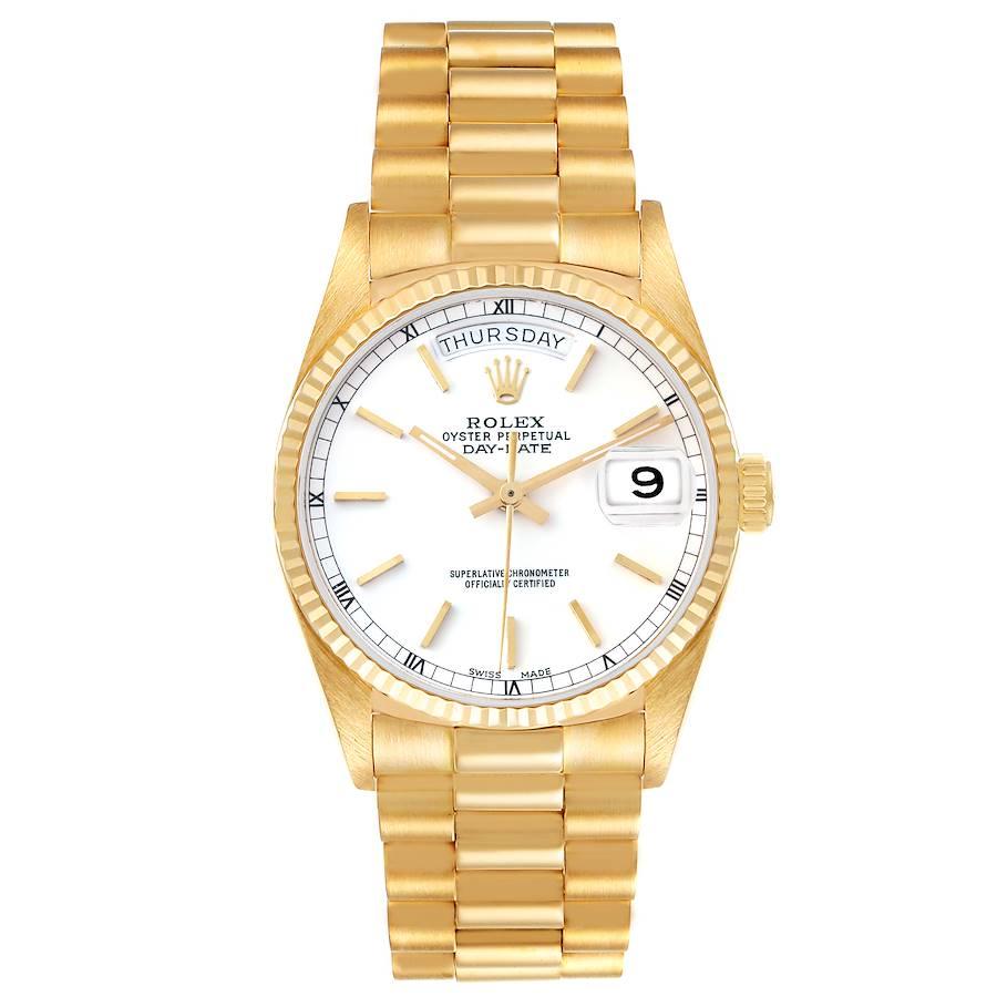 Rolex President Day-Date 36mm Yellow Gold White Dial Mens Watch 18038. Officially certified chronometer self-winding movement. 18k yellow gold oyster case 36.0 mm in diameter.  Rolex logo on a crown. 18k yellow gold fluted bezel. Scratch resistant