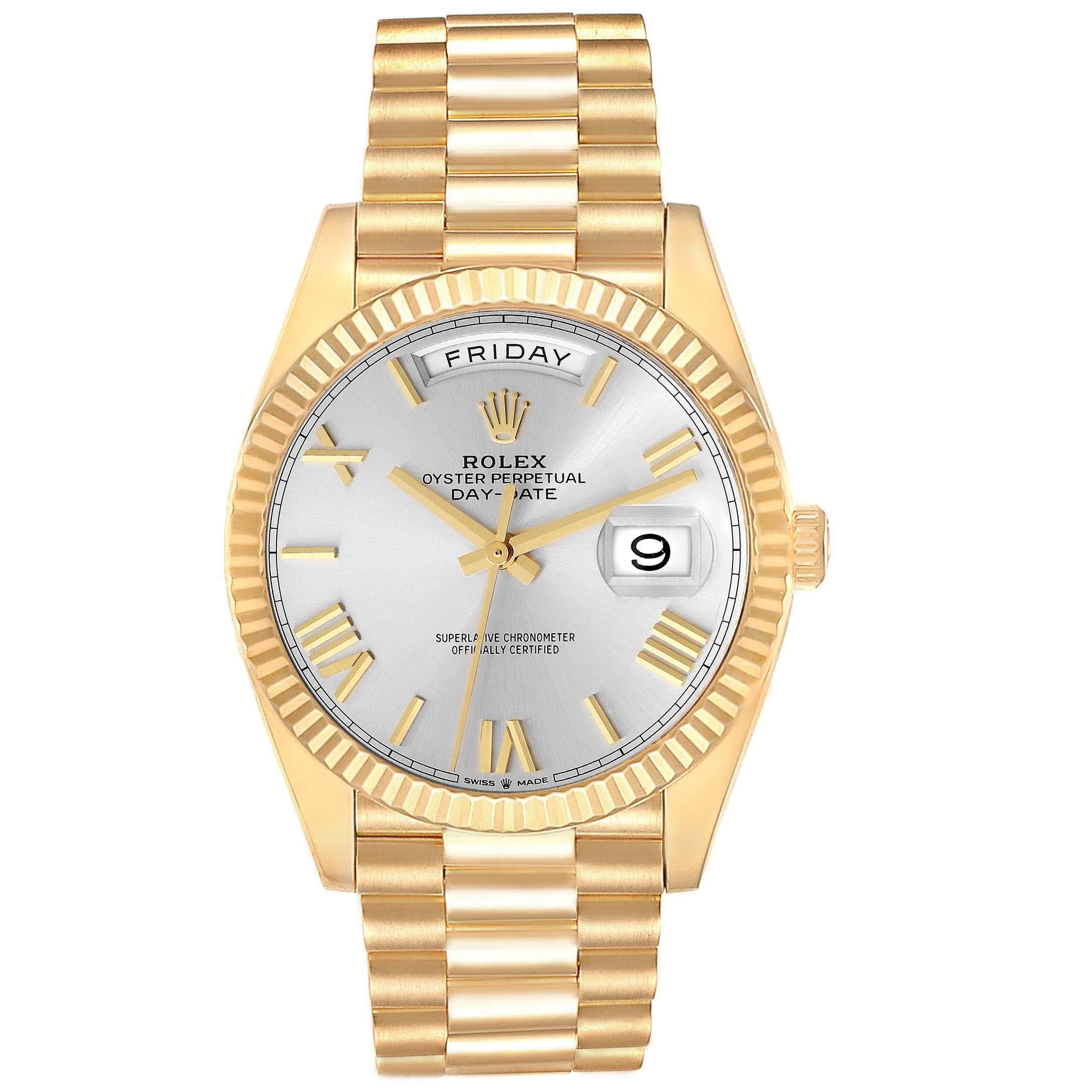 Rolex President Day Date 40 Yellow Gold Silver Dial Mens Watch 228238 Card. Officially certified chronometer automatic self-winding movement. Double quick set function. 18k yellow gold oyster case 40.0 mm in diameter.  Rolex logo on the crown. 18K