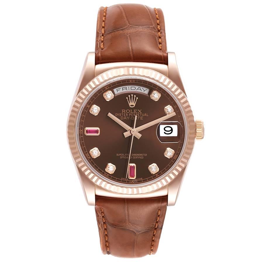 Rolex President Day-Date Everose Gold Diamond Ruby Dial Watch 118135 Box Card. Officially certified chronometer self-winding movement. 18k rose gold oyster case 36.0 mm in diameter.  Rolex logo on the crown. 18k rose gold fluted bezel. Scratch