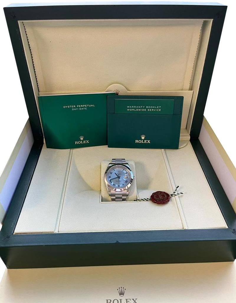 Rolex President Day-Date II Ice Blue Dial Platinum Mens Watch 218206. Officially certified chronometer self-winding movement. Double-quick set function. Platinum oyster case 41.0 mm in diameter. Rolex logo on a crown. Platinum smooth bezel.