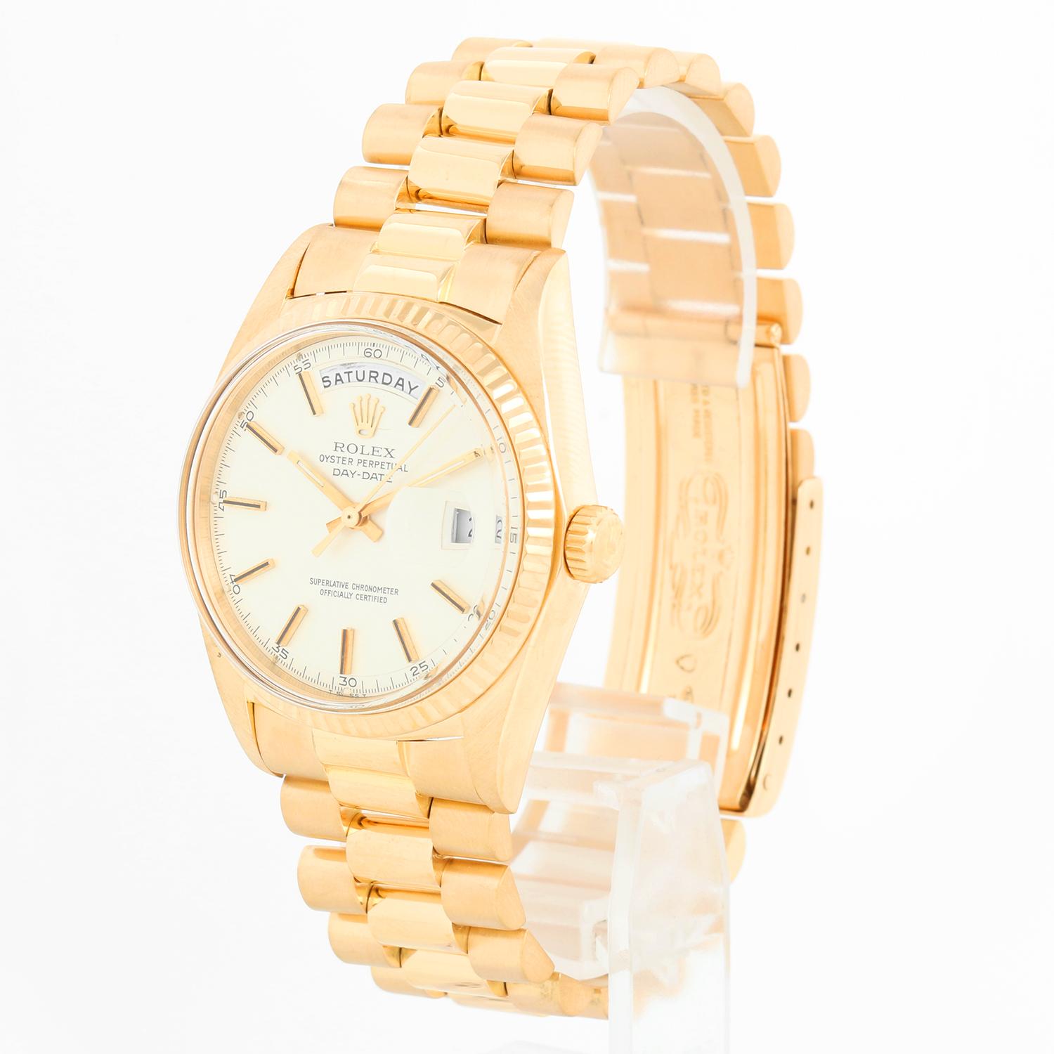 Rolex President Day-Date Men's 18k Gold Watch 1803 - Automatic winding; non-quickset, Acrylic crystal. 18k yellow gold case with fluted bezel (36 mm ). Silver dial with stick hour markers. Rolex President bracelet with gold buckle. Pre-owned with
