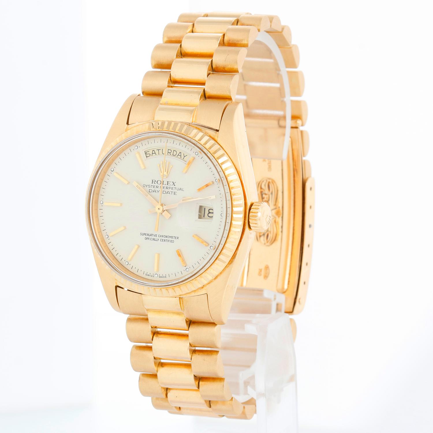 Rolex President Day-Date Men's 18k Gold Watch 1803 - Automatic winding; non-quickset, Acrylic crystal. 18k yellow gold case with fluted bezel (36mm). Cream dial with stick hour markers . Rolex President bracelet with gold buckle. Pre-owned with