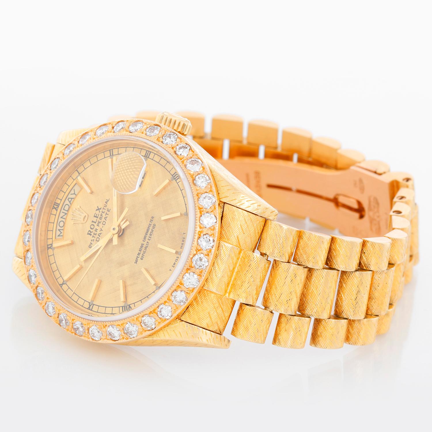 Rolex President Day-Date Men's 18k Gold Watch 18038 - Automatic winding; quick-set; sapphire crystal. 18k yellow gold custom florentine case with custom diamond bezel ( 36 mm ) . Champagne textured dial. Custom florentine president bracelet.