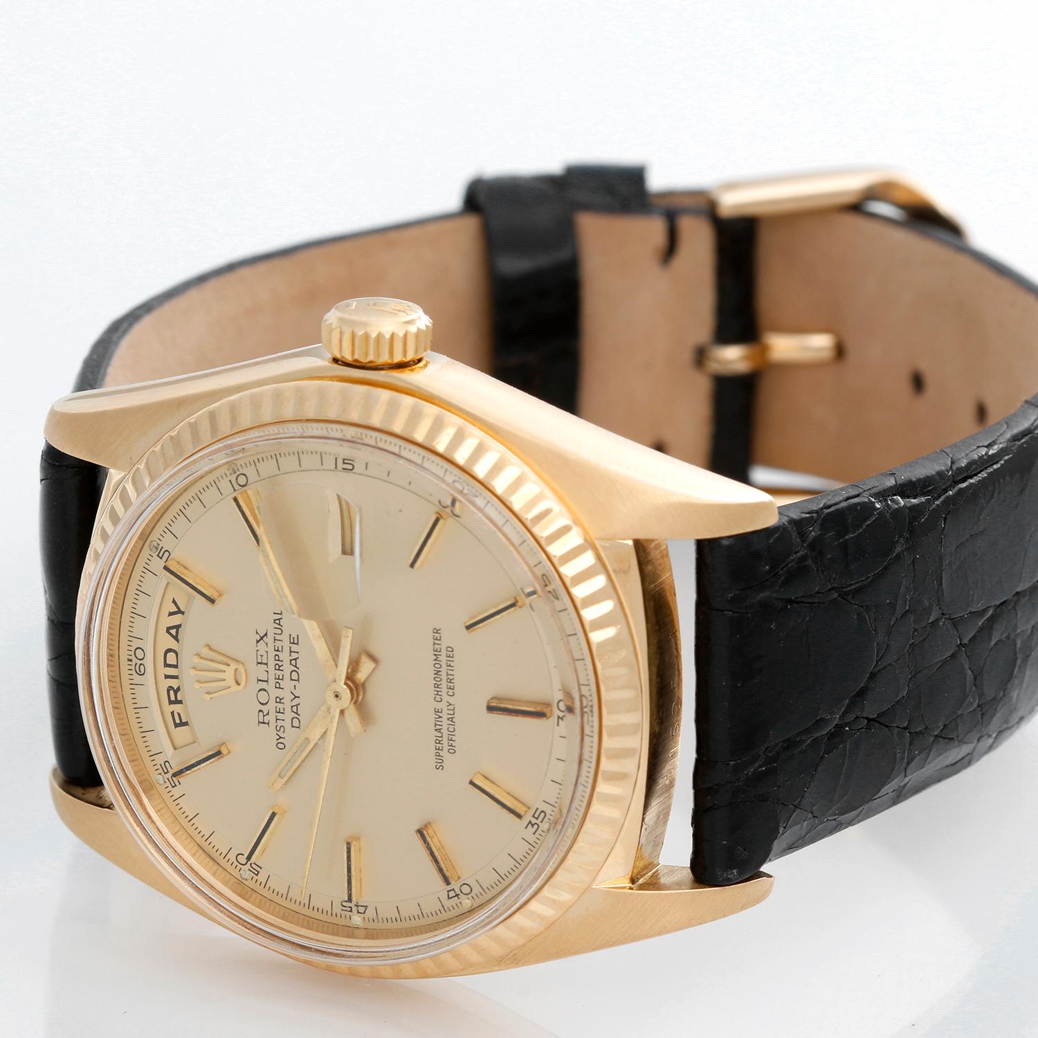 Rolex President Day-Date Men's 18k Yellow Gold Watch 1803 - Automatic winding; 26 jewels, non-quick-set; acrylic crystal. 18k yellow gold case with fluted bezel (36mm diameter). Champagne matte dial with stick hour markers . Black leather strap with