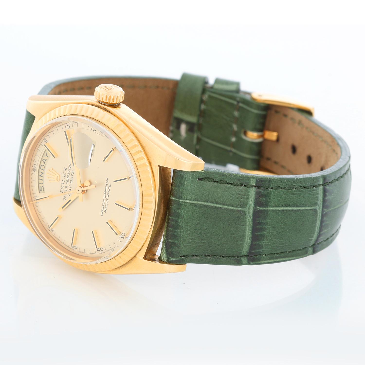 Rolex President Day-Date Men's 18k Yellow Gold Watch 1803 - Automatic winding; 26 jewels, non-quick-set; acrylic crystal. 18k yellow gold case with fluted bezel (36mm diameter). Champagne matte dial with stick hour markers. Leather strap with Rolex