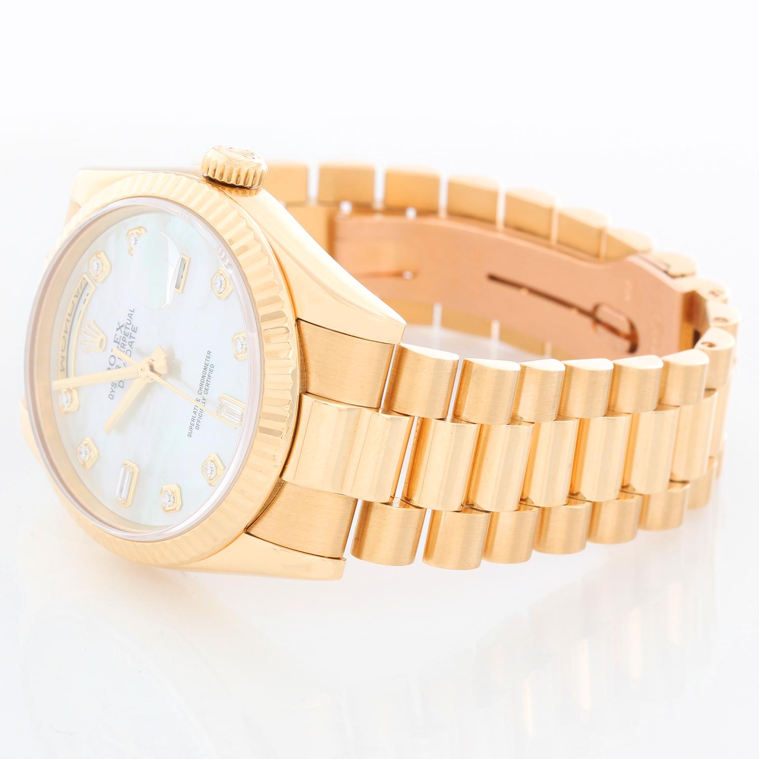 Rolex President Day-Date Men's Mother of Pearl Watch 118238 - Automatic winding, 31 jewels, Quickset, sapphire crystal. 18k yellow gold case with fluted bezel . Factory Mother of Pearl diamond dial. 18k yellow gold hidden-clasp President bracelet.