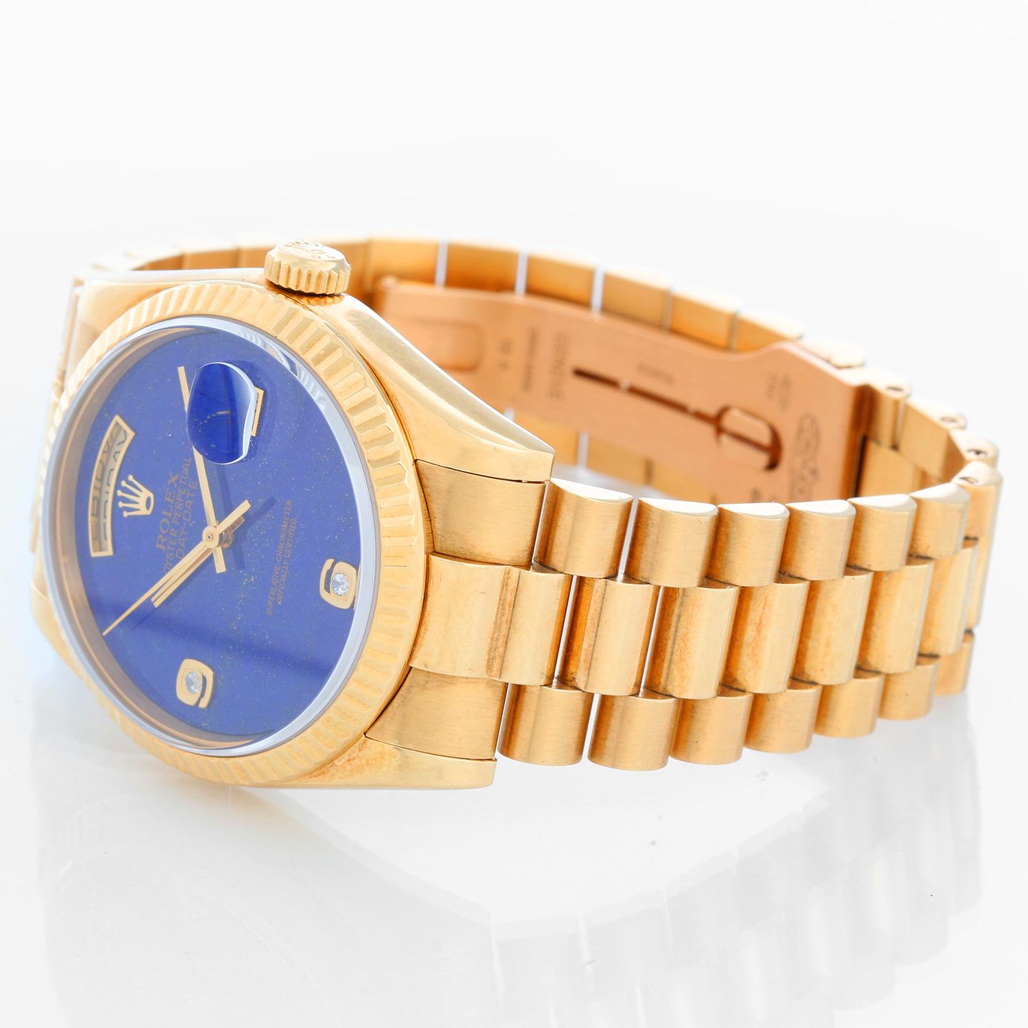Rolex President Day-Date Men's Watch 118238 - Automatic winding, 31 jewels, Quickset, sapphire crystal. 18k yellow gold case with fluted bezel (36mm diameter). Genuine Rolex Lapis dial with diamonds at 6 & 9 o clock. 18k yellow gold hidden-clasp