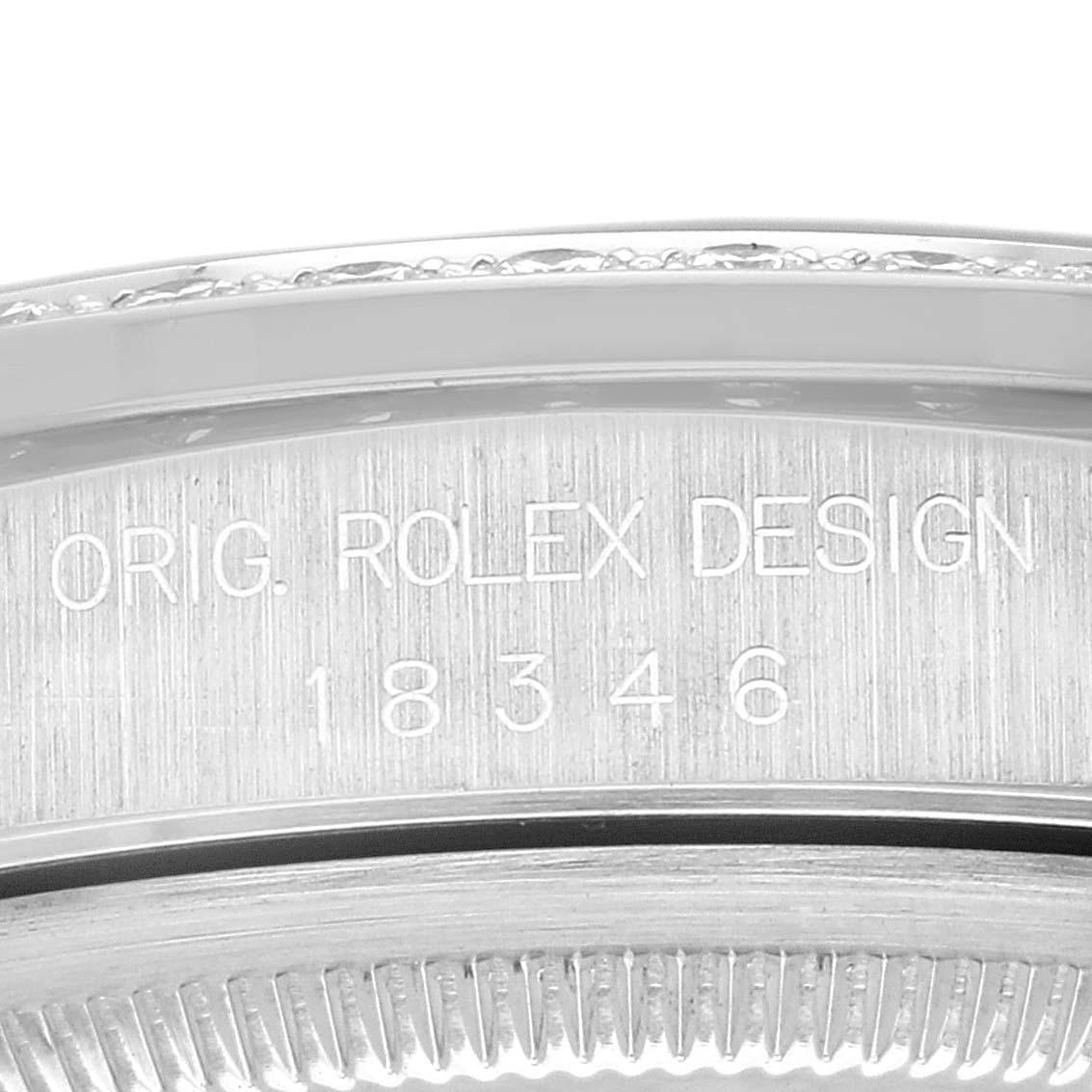 Rolex President Day-Date Platinum Blue Myriad Diamond Dial Mens Watch 18346. Officially certified chronometer self-winding movement. Platinum oyster case 36.0 mm in diameter. Rolex logo on a crown. Original Rolex factory diamond bezel. Scratch