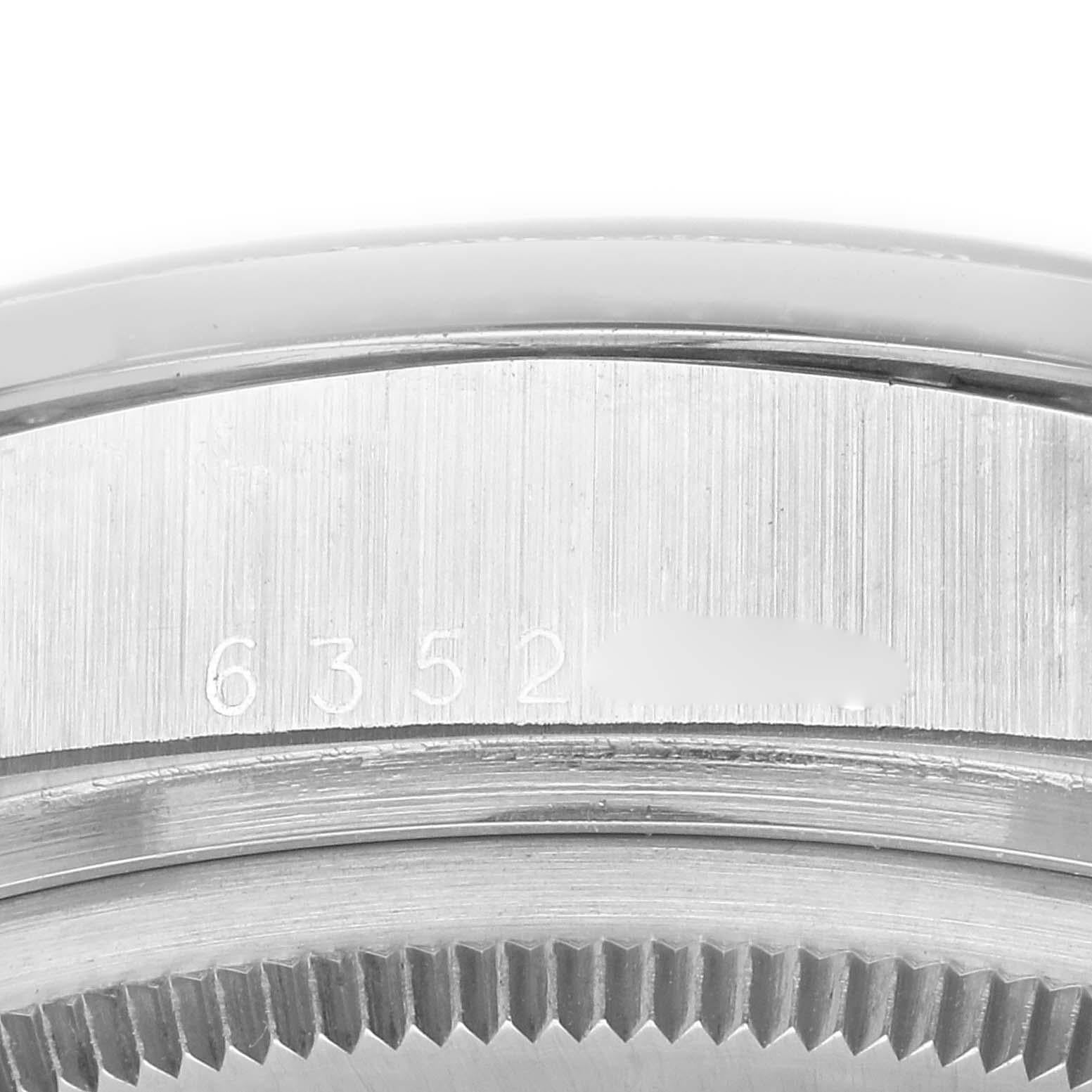 Rolex President Day-Date Montre homme cadran argenté platine diamant 18046. Mouvement à remontage automatique certifié officiellement chronomètre avec fonction de date rapide. Boîtier oyster en platine de 36,0 mm de diamètre. Logo Rolex sur une