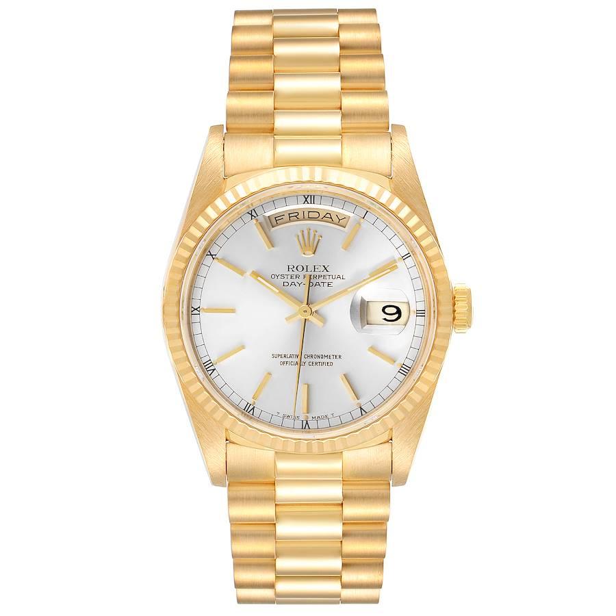 Rolex President Day-Date Silver Dial Yellow Gold Mens Watch 18238. Officially certified chronometer self-winding movement. 18k yellow gold oyster case 36.0 mm in diameter. Rolex logo on a crown. 18K yellow gold fluted bezel. Scratch resistant
