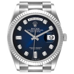 Rolex Montre President Day-Date en or blanc avec cadran bleu et diamants, pour hommes 128239, avec carte de visite