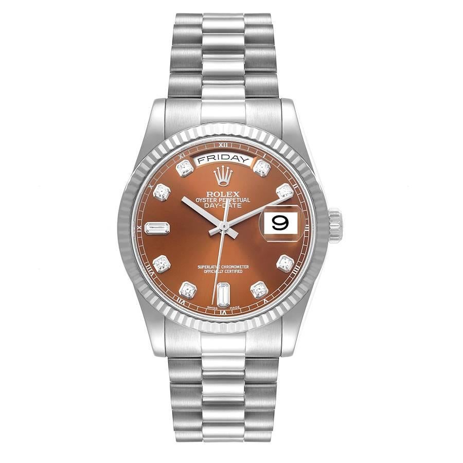 Rolex President Day-Date White Gold Bronze Diamond Dial Mens Watch 118239. Officially certified chronometer self-winding movement. 18K white gold oyster case 36.0 mm in diameter. Rolex logo on the crown. 18k white gold fluted bezel. Scratch