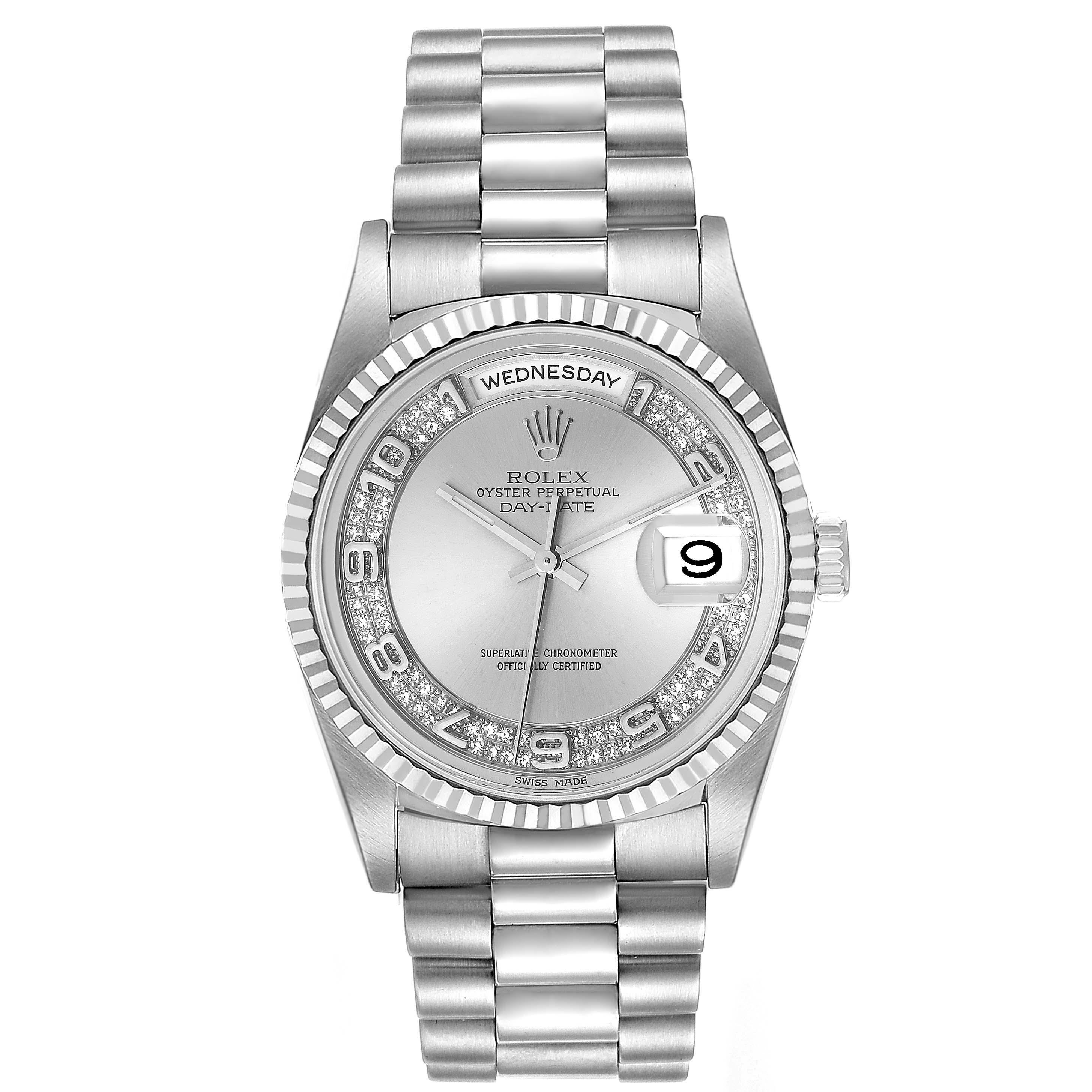 Rolex President Day-Date White Gold Myriad Diamond Dial Mens Watch 18239. Officially certified chronometer self-winding movement. 18k white gold oyster case 36.0 mm in diameter. Rolex logo on a crown. 18K white gold fluted bezel. Scratch resistant