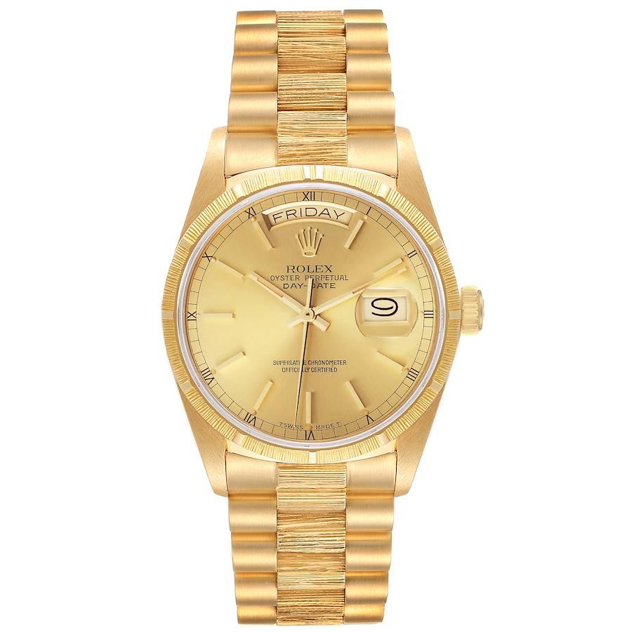 Rolex President Day-Date Yellow Gold Bark Finish Mens Watch 18078. Officially certified chronometer self-winding movement with quickset date function. 18k yellow gold oyster case 36.0 mm in diameter. Rolex logo on a crown. 18k yellow gold bark