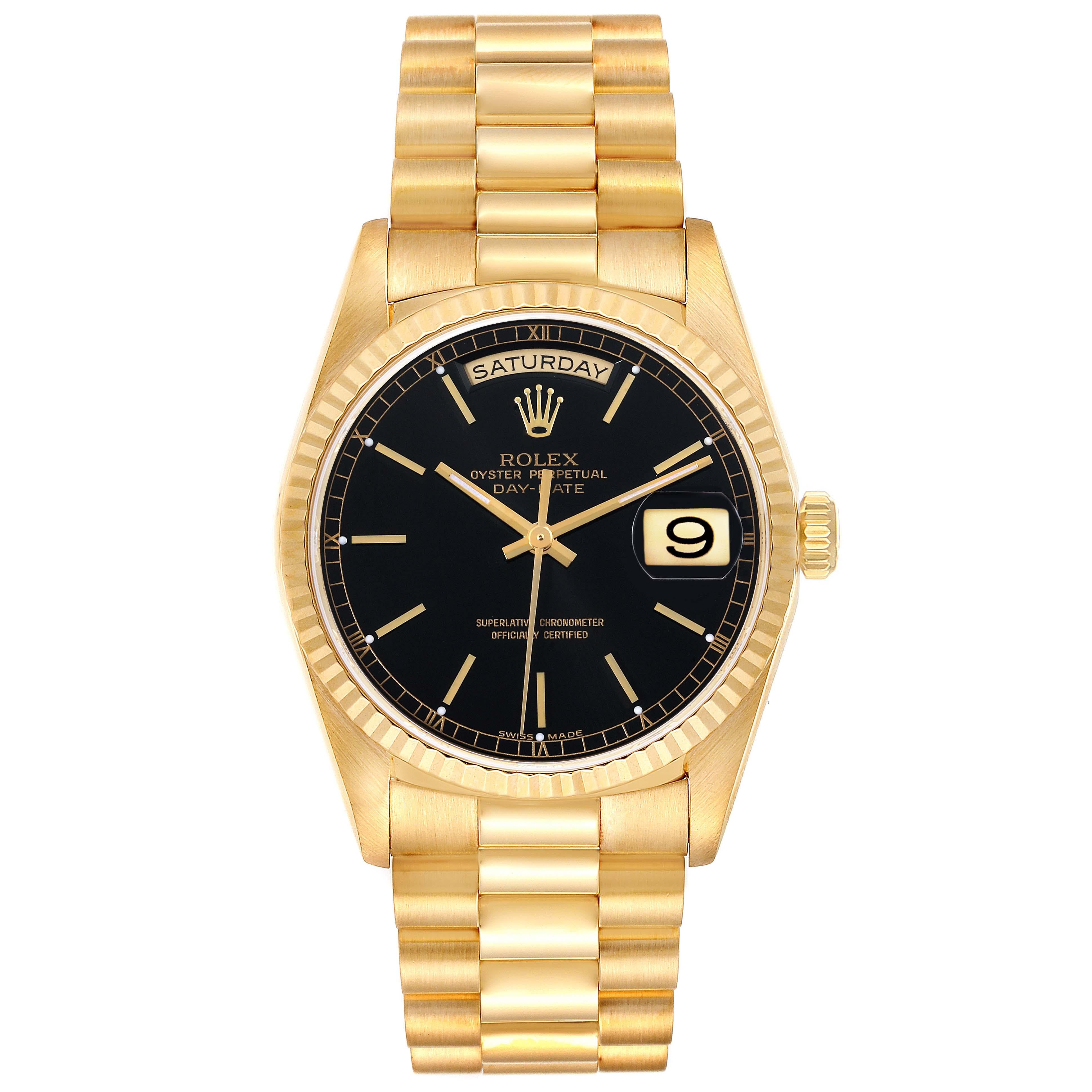 Rolex President Day-Date Yellow Gold Black Dial Mens Watch 18238. Officially certified chronometer automatic self-winding movement. 18k yellow gold oyster case 36.0 mm in diameter. Rolex logo on the crown. 18K yellow gold fluted bezel. Scratch