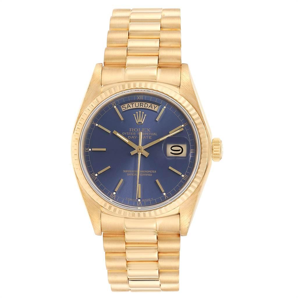 Rolex President Day-Date Yellow Gold Blue Dial Mens Watch 18038. Officially certified chronometer self-winding movement. 18k yellow gold oyster case 36.0 mm in diameter. Rolex logo on a crown. 18k yellow gold fluted bezel. Scratch resistant sapphire
