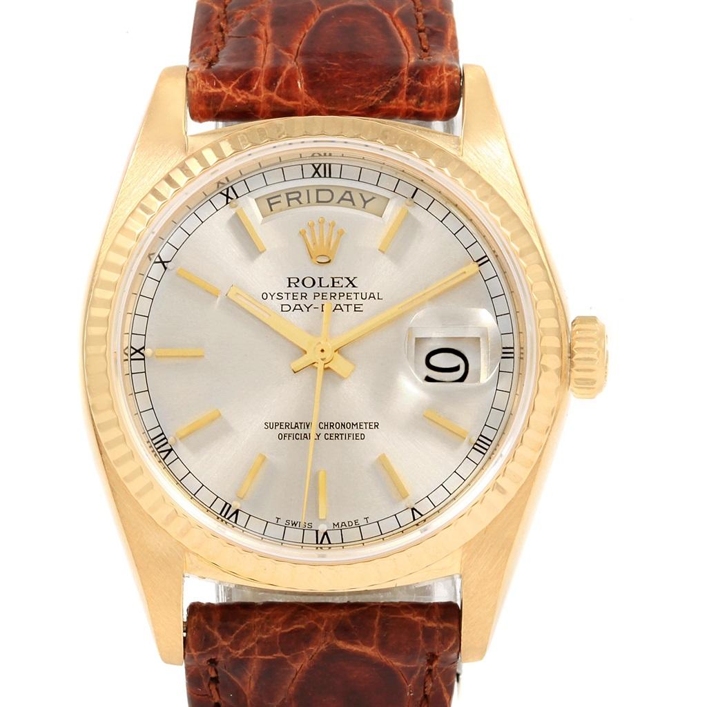 Rolex President Day-Date Yellow Gold Brown Strap Mens Watch 18038. Officially certified chronometer self-winding movement. 18k yellow gold oyster case 36.0 mm in diameter. Rolex logo on a crown. 18k yellow gold fluted bezel. Scratch resistant