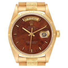 Rolex President Day-Date Herrenuhr aus Gelbgold mit Wurzelholz-Zifferblatt 18038