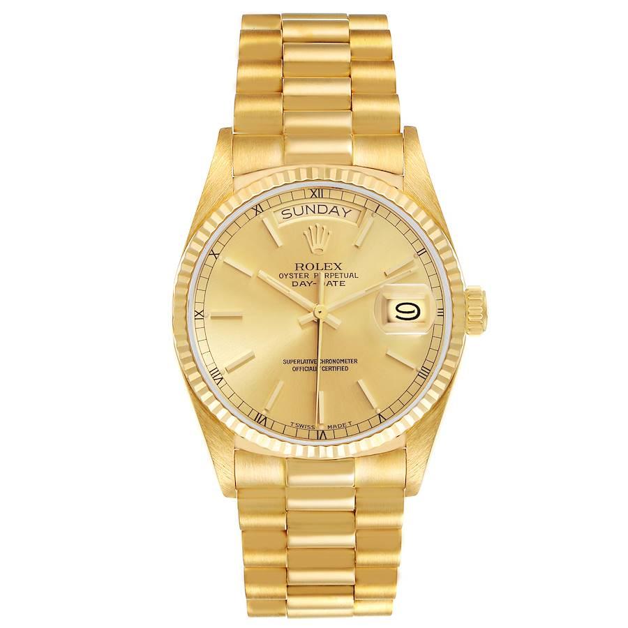 Rolex President Day-Date Yellow Gold Champagne Dial Mens Watch 18038. Officially certified chronometer self-winding movement. 18k yellow gold oyster case 36.0 mm in diameter.  Rolex logo on a crown. 18k yellow gold fluted bezel. Scratch resistant