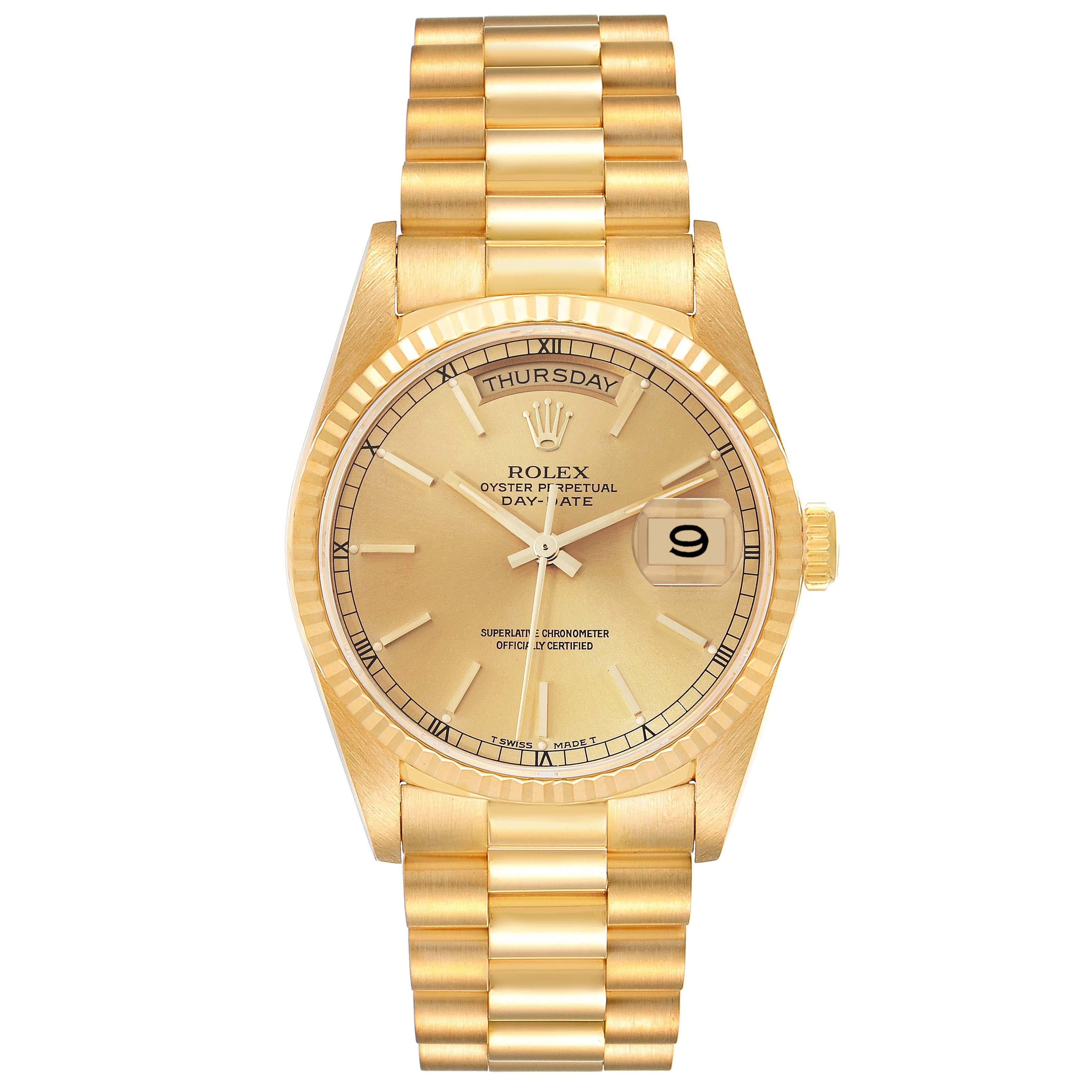 Rolex President Day-Date Yellow Gold Champagne Dial Mens Watch 18238 Box Papers. Officially certified chronometer automatic self-winding movement. 18k yellow gold oyster case 36.0 mm in diameter.  Rolex logo on the crown. 18K yellow gold fluted