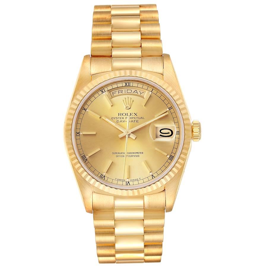 Rolex President Day-Date Yellow Gold Champagne Dial Mens Watch 18238. Officially certified chronometer self-winding movement. 18k yellow gold oyster case 36.0 mm in diameter.  Rolex logo on a crown. 18K yellow gold fluted bezel. Scratch resistant