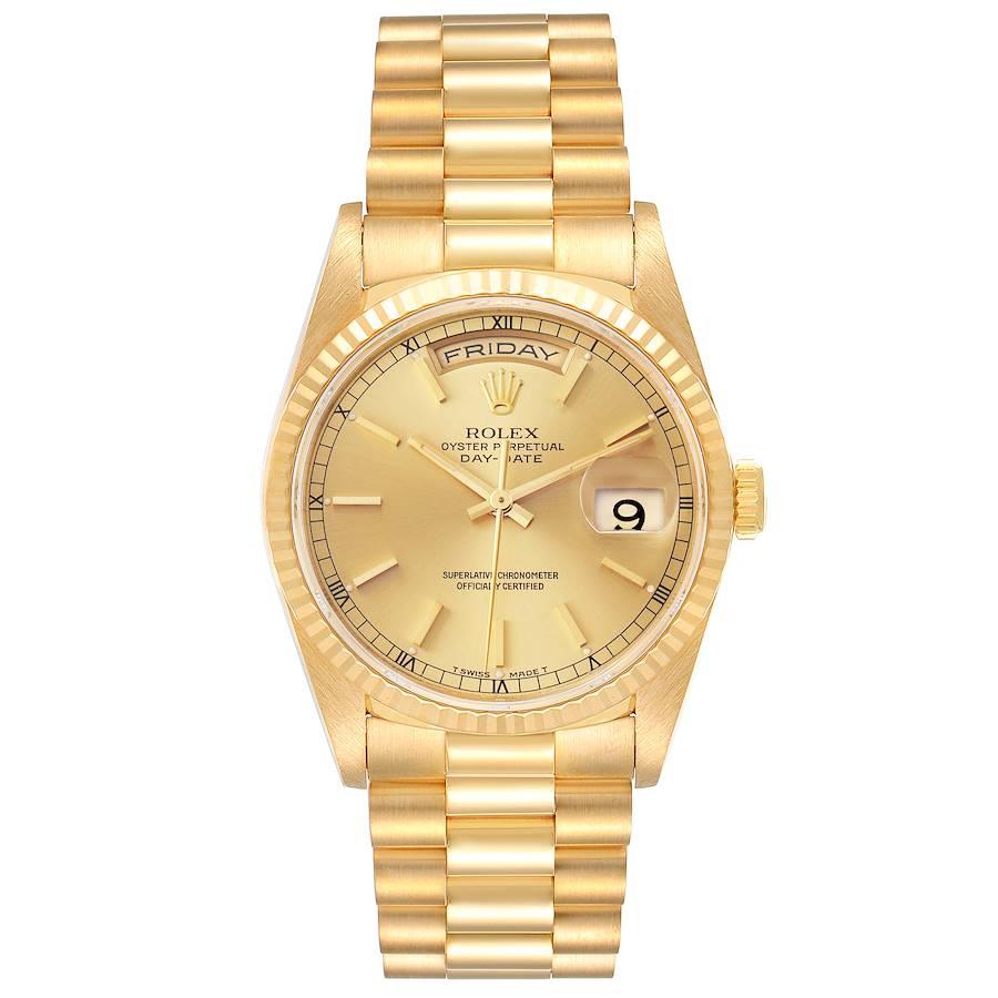 Rolex President Day-Date Yellow Gold Champagne Dial Mens Watch 18238. Officially certified chronometer self-winding movement. 18k yellow gold oyster case 36.0 mm in diameter.  Rolex logo on a crown. 18K yellow gold fluted bezel. Scratch resistant