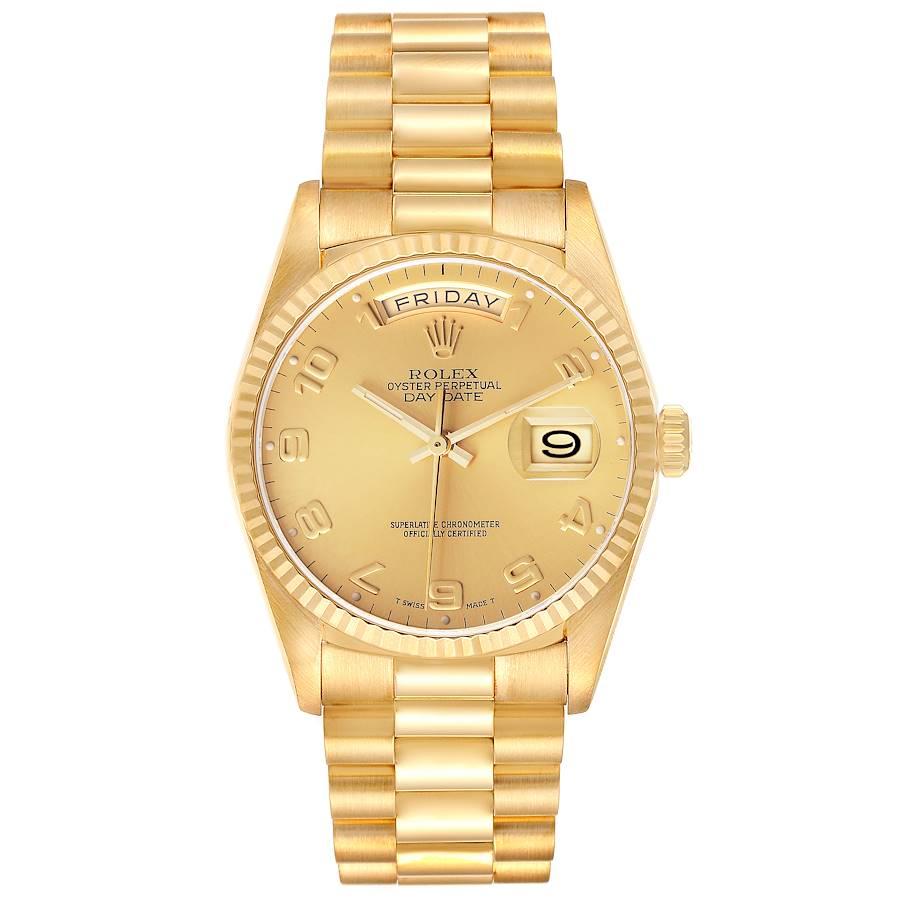 Rolex President Day-Date Yellow Gold Champagne Dial Mens Watch 18238. Officially certified chronometer self-winding movement. 18k yellow gold oyster case 36.0 mm in diameter.  Rolex logo on a crown. 18K yellow gold fluted bezel. Scratch resistant