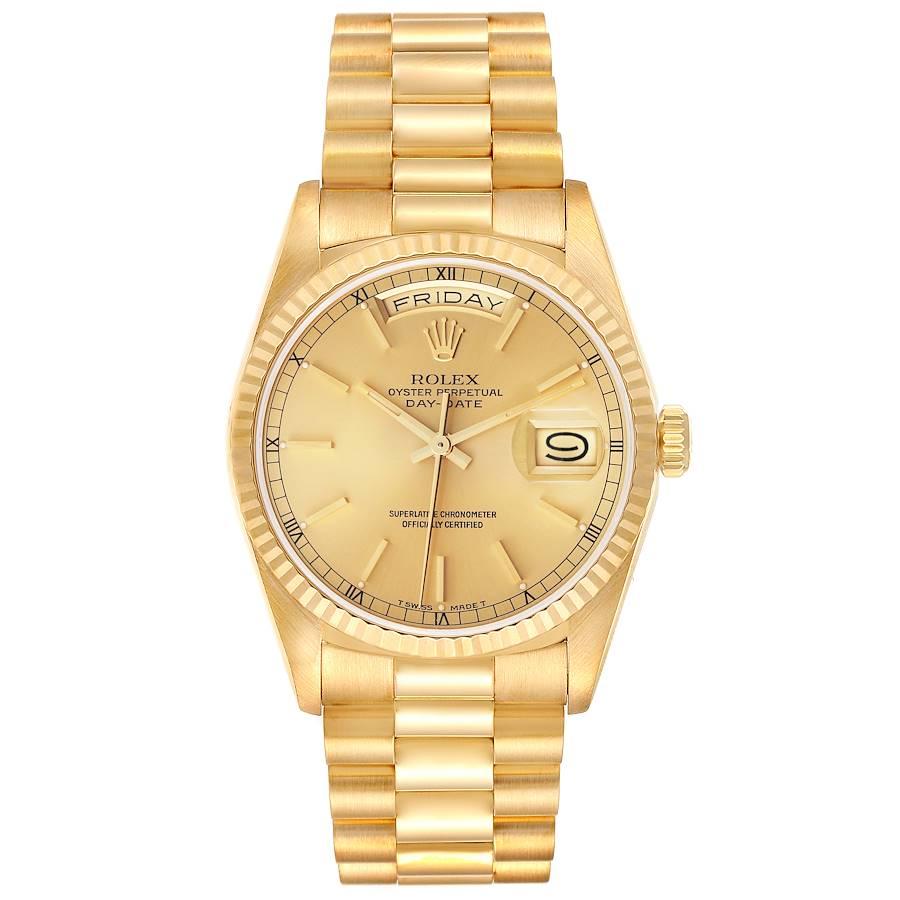 Rolex President Day Date Yellow Gold Champagne Dial Mens Watch 18238. Officially certified chronometer self-winding movement. 18k yellow gold oyster case 36.0 mm in diameter. Rolex logo on the crown. 18K yellow gold fluted bezel. Scratch resistant