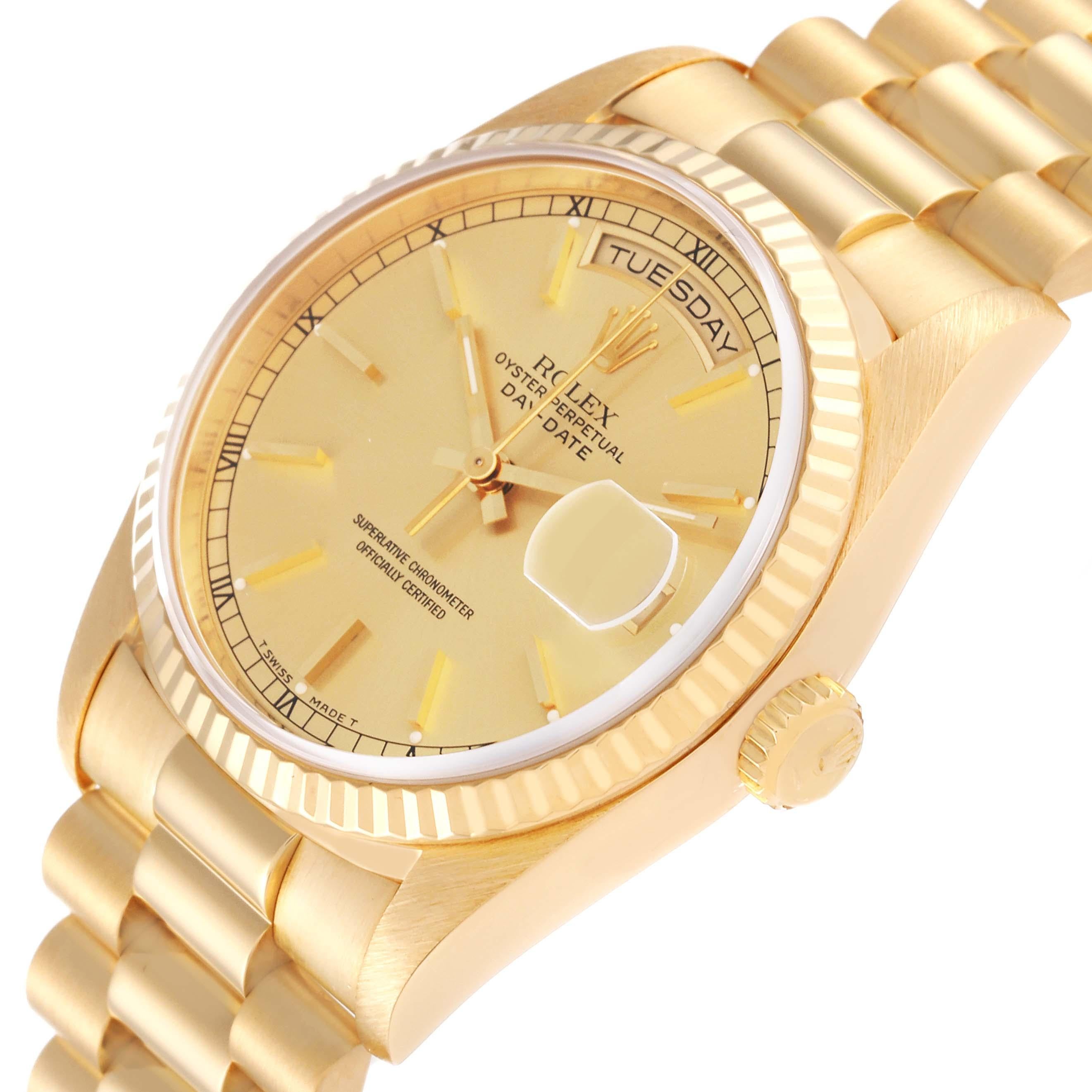 Rolex President Day-Date Yellow Gold Champagne Dial Mens Watch 18238. Officially certified chronometer automatic self-winding movement. 18k yellow gold oyster case 36.0 mm in diameter.  Rolex logo on the crown. 18K yellow gold fluted bezel. Scratch