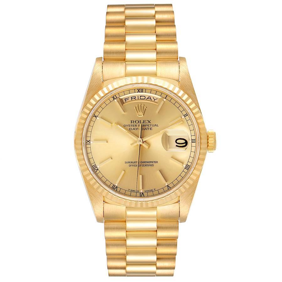 Rolex President Day-Date Yellow Gold Champagne Dial Mens Watch 18238 Papers. Officially certified chronometer self-winding movement. 18k yellow gold oyster case 36.0 mm in diameter.  Rolex logo on a crown. 18K yellow gold fluted bezel. Scratch