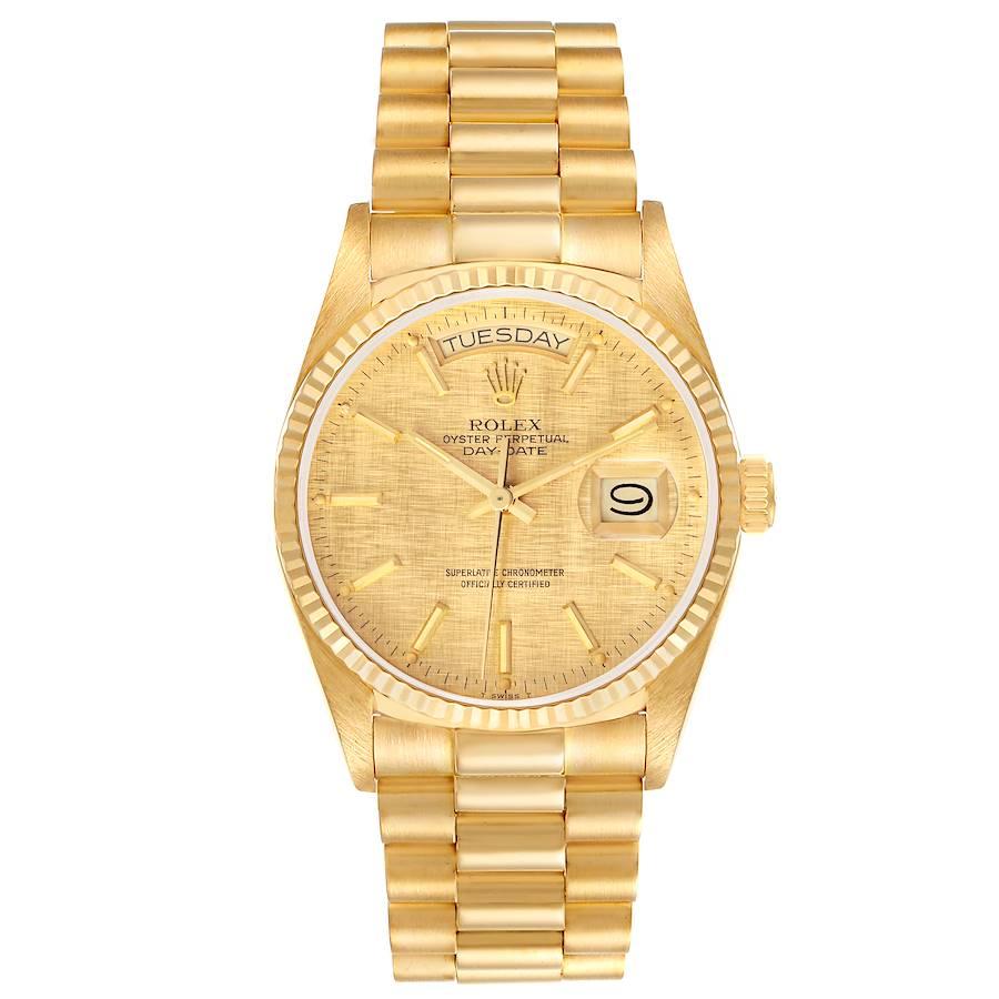 Rolex President Day-Date Yellow Gold Champagne Linen Dial Watch 18038 Papers. Officially certified chronometer self-winding movement. 18k yellow gold oyster case 36.0 mm in diameter.  Rolex logo on a crown. 18k yellow gold fluted bezel. Scratch